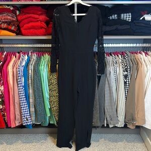 Unbranded black long lace sleeve back zipper v neck jumpsuit size S.